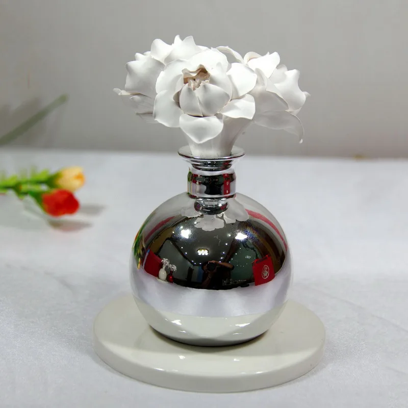 
White ceramic round bottle nebulizer essential oil diffuser 