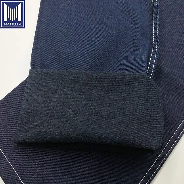 using rapier loom making machine blue warp black weft 75% cotton 25% polyester blend TC jeans denim fabric in bangladesh