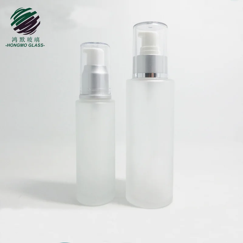 OEM 100ML cylinder cosmetic glass bottle and jars frosted glass bottle with matte silver pump