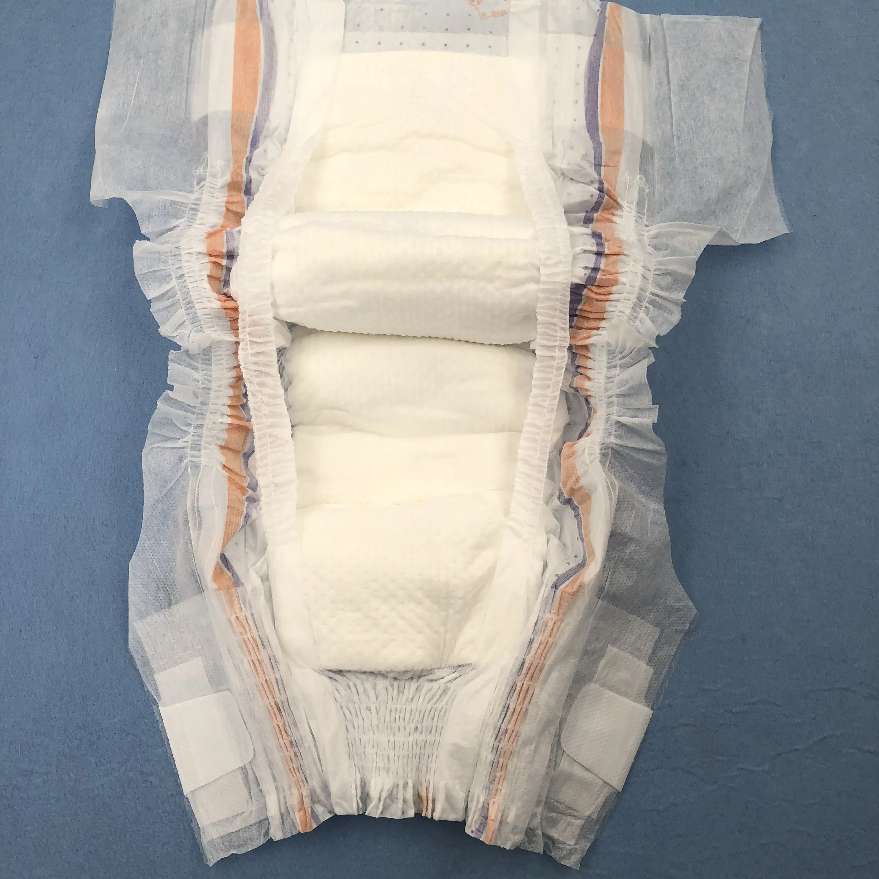 Low price disposable magic tape elastic waist band baby diapers manufacturer with OEM service