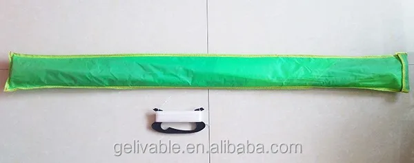 Chinese child flying kite with long tail