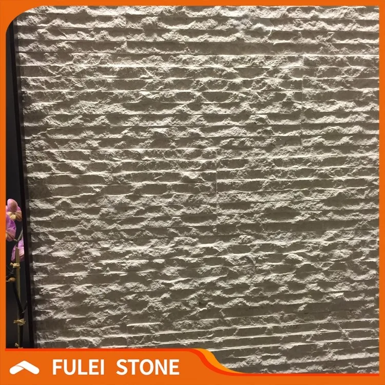 Облицовочная плитка из белого известняка с резной поверхностью