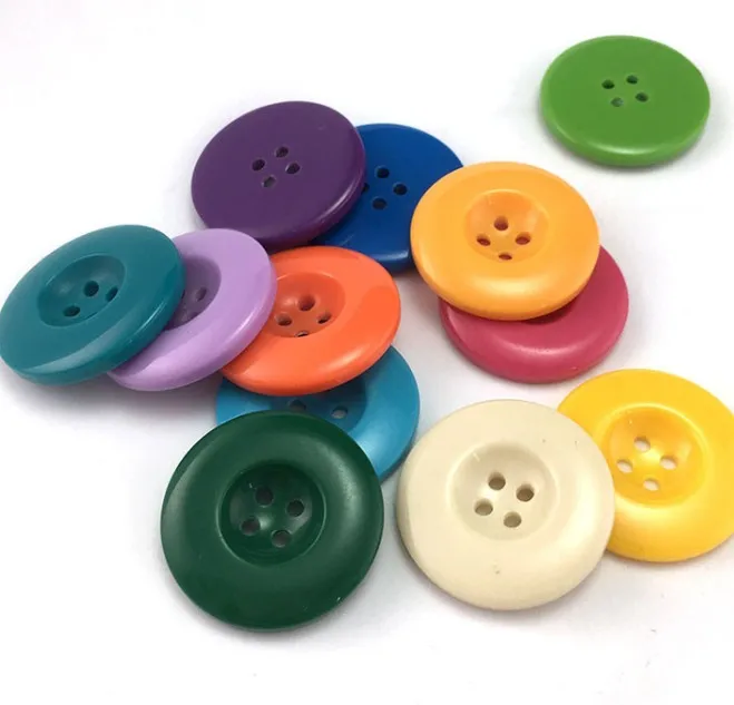 4 hole round debossed soft rubber clothing button