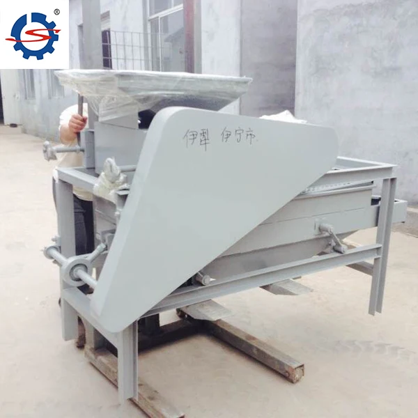 High capacity almond shell breaking machine