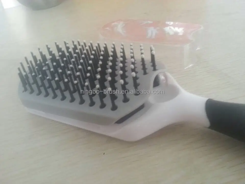 
professional plastic wholesale professional hair removeable brush self cleaning hair brush with spray pump 