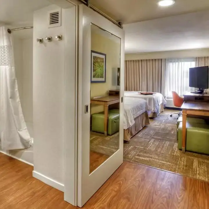 
Hotel and Hospitality Mirror Sliding Barn Door Inlaying Wood SLIDING DOORS with Interior Stainless Steel Sliding Track 
