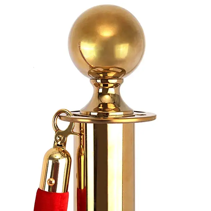 golden barrier stanchion set with red velvet rope