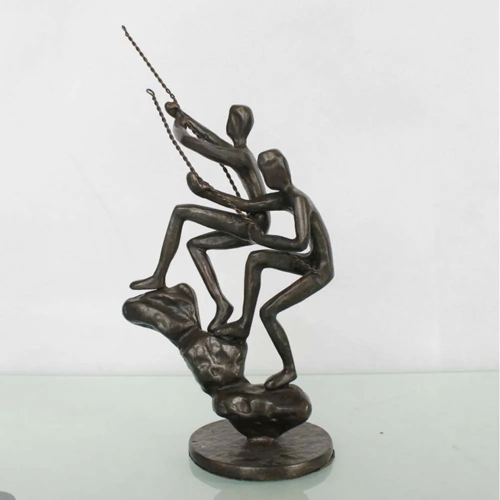Cast iron climbing man metal abstract art sculptures for home decoration