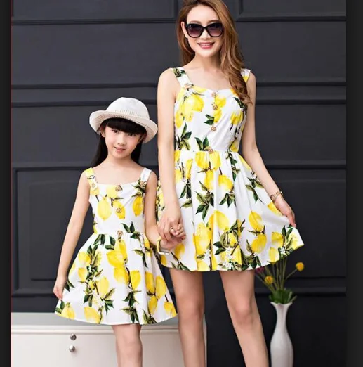 Fancy mom and daughter matching clothing, stylish mother and girls dresses printed party dress image