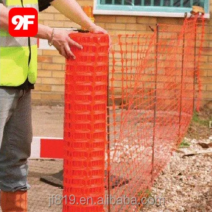 orange warning barrier fence plastic safety fence