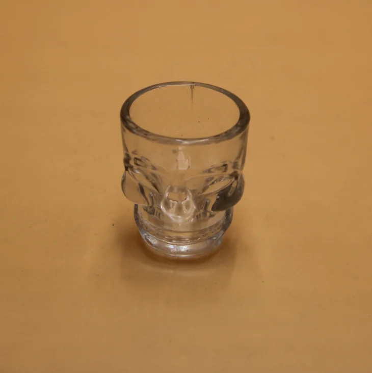 Colored skull shaped shot glasses cup