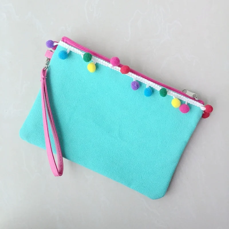 Hot selling canvas monogram good quality pom pom makeup bag cosmetic women clutch