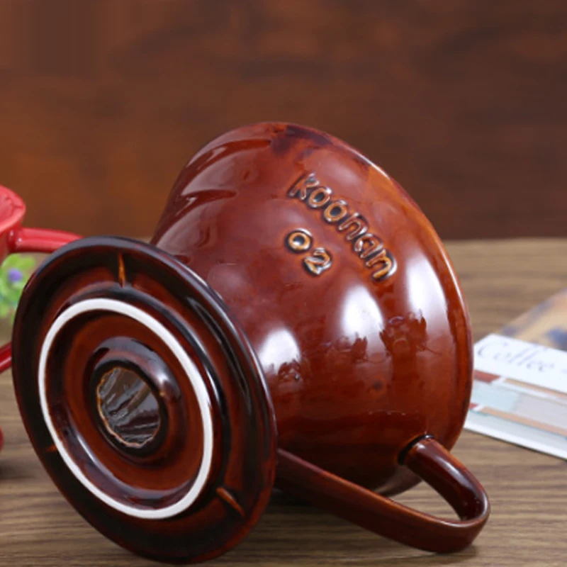 
Ceramic filter cup dripping coffee into coffee dripper reusable filter coffee dripper 