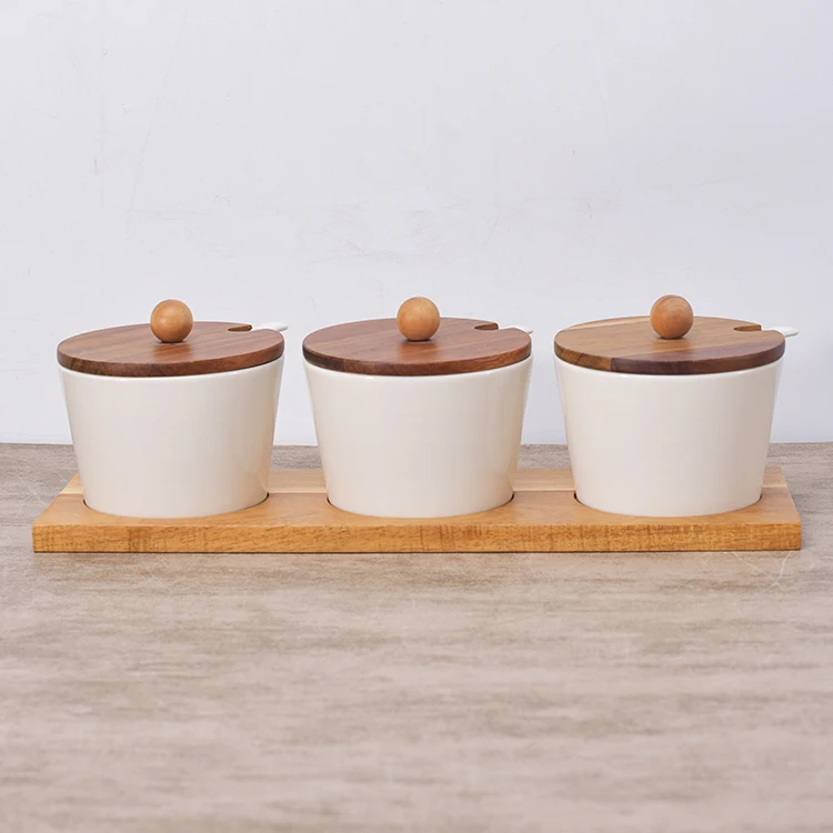 Kitchenware white ceramic condiment kitchen spice jars spice jar set with wooden lid and stand
