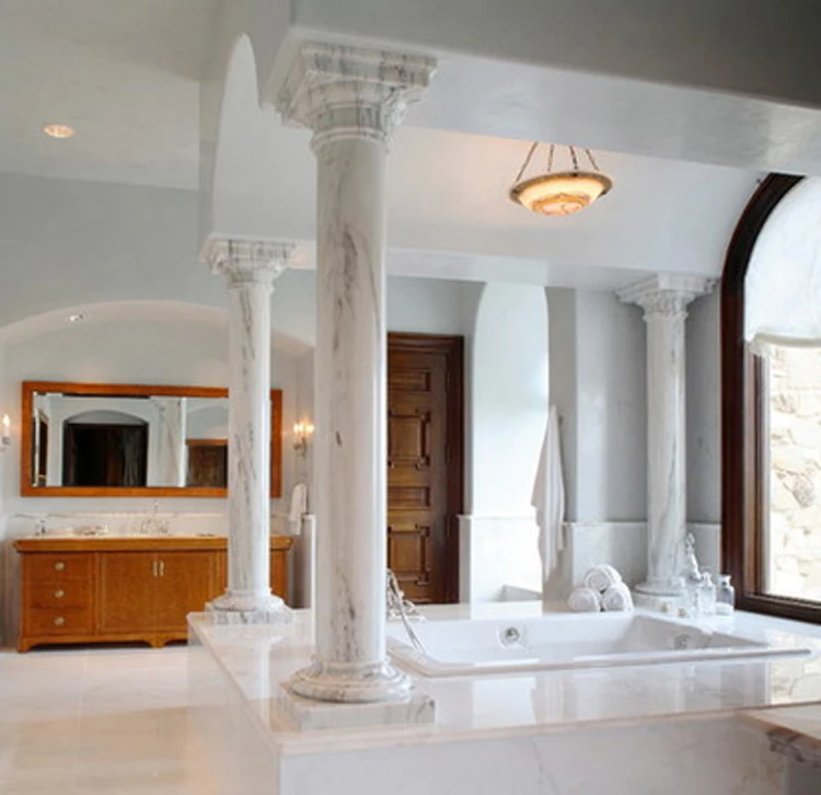 White marble carved main gate pillars design