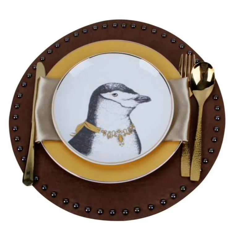 Fine porcelain  dinner plate set with cutlery and mat  for one people