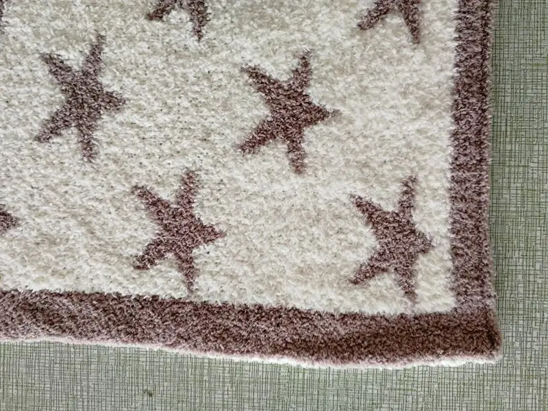 luxury quality 5 star hotel super soft 100% polyester micro feather yarn fiber pink baby star knit throw blanket