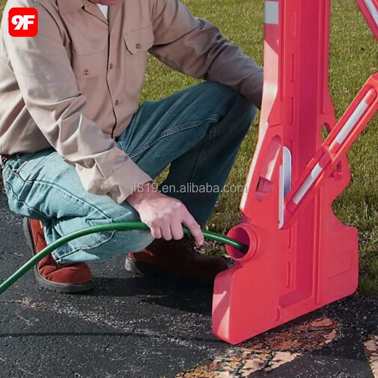 Plastic expandable portable traffic safety barrier fence