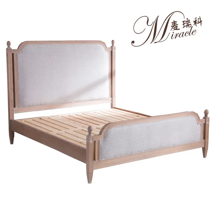 Antique linen upholstered french weathered oak frame bed