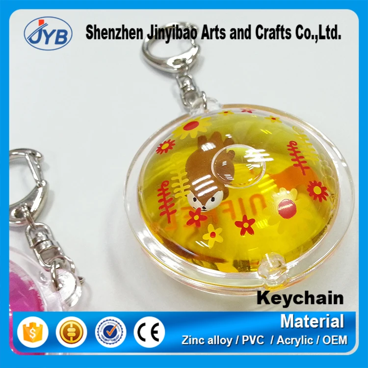 custom fashion floating acrylic keyring round shape liquid inside keychain