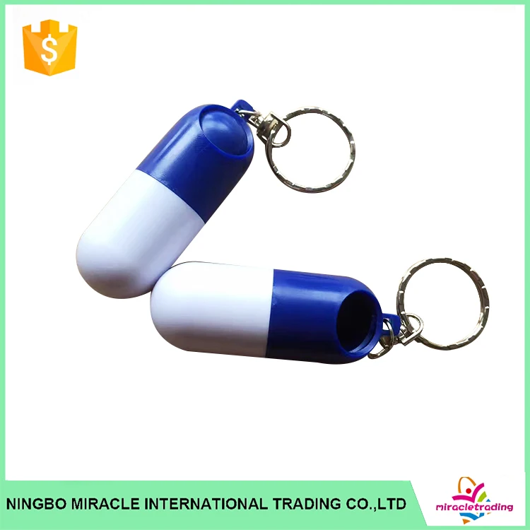 portable capsule shaped pill box with keychain