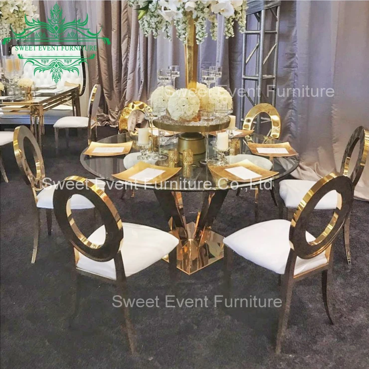 Clear glass top wedding reception chairs and tables with ss base