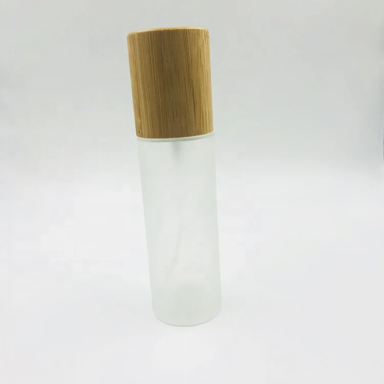 
Top grade matte glass 100ml spray bottle with bamboo cap / frosted bottle pump sprayer packaging / cosmetic packaging dispenser 