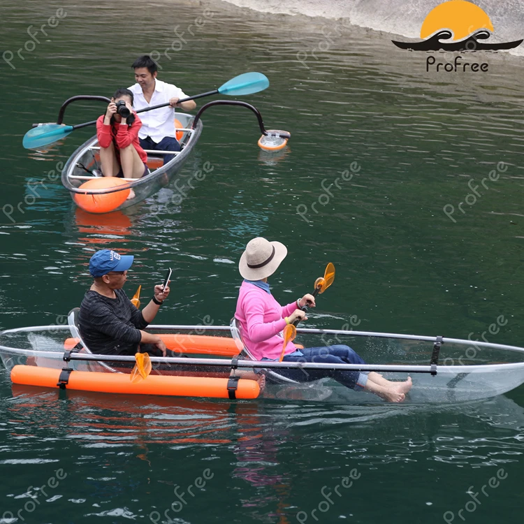 
transparent kayak with outrigger and airbag ans fishing life jacket 