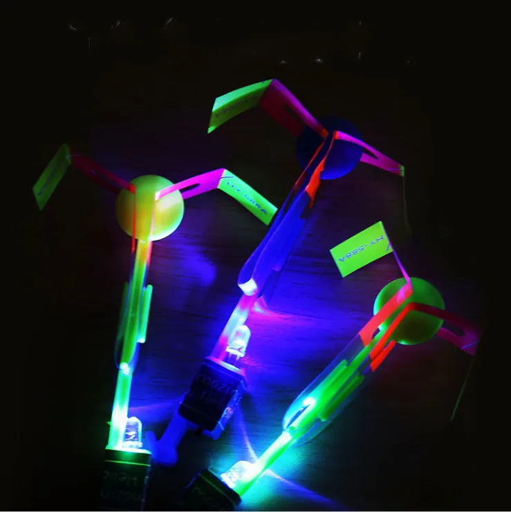 Amazing Gadget Led Light Toy Elastic Powered Slingshot Rubber Band Flying Arrow Helicopter