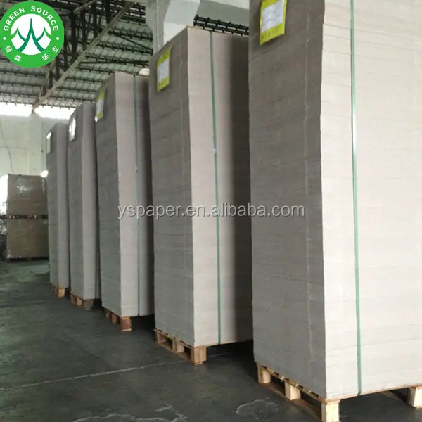 Склад бумаги, много листов, серый картон с ламинированной подкладкой