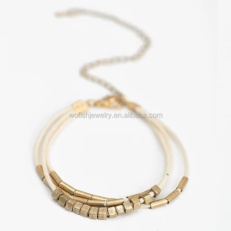 Antique gold White Strand Leather brass beaded tube Bracelet