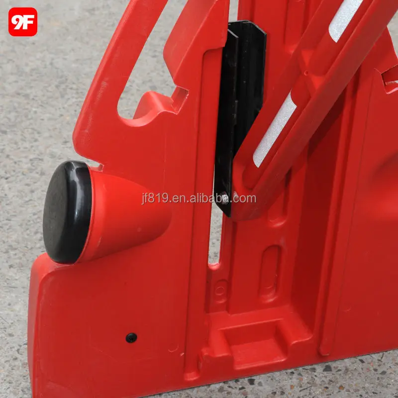 Plastic expandable portable traffic safety barrier fence