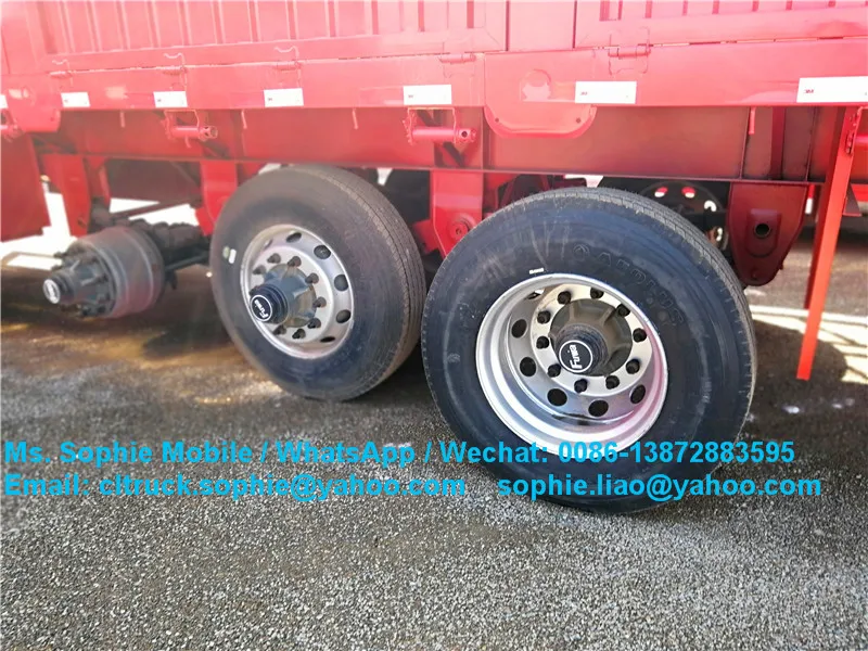 tri-axle 50tons 60t lowboy flatbed truck low bed semi trailer with hydraulic ramp