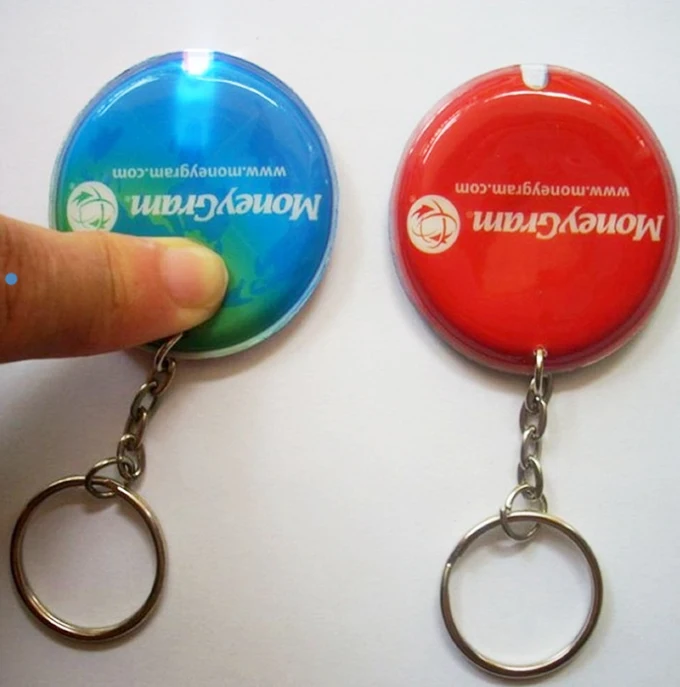 Promotional useful pvc led keychain light keychain/flashlight keychain with Logo