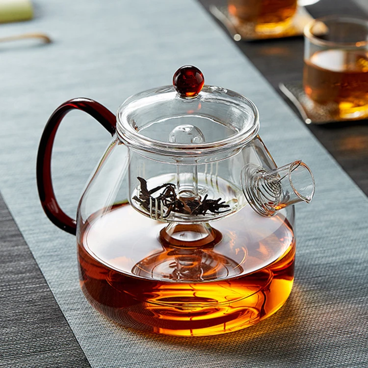 Heat resistant clear glass teapot to boil water