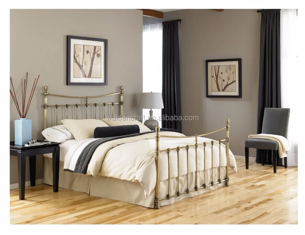 Metal panel bed with duo panels and scalloped castings antique brass finish