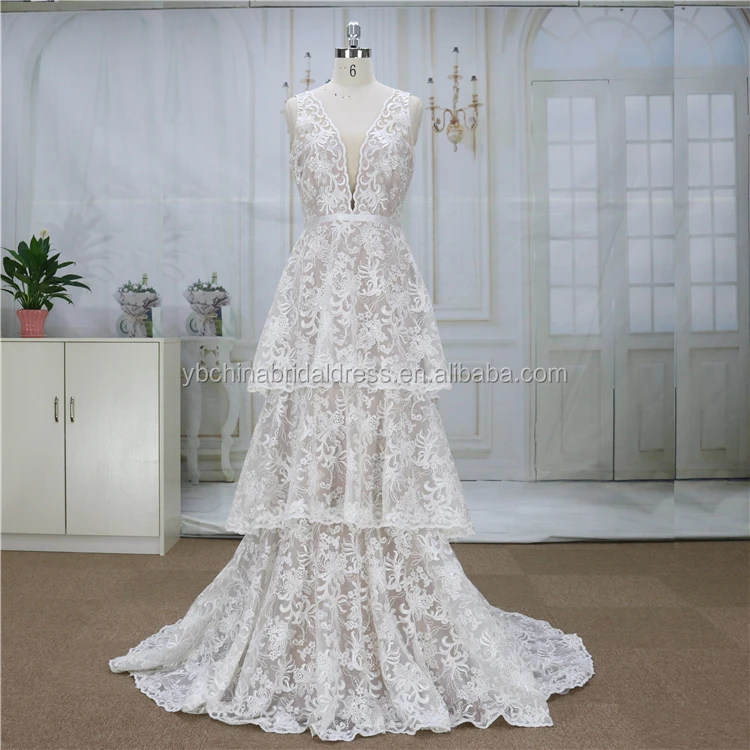 With two shoulder and V neckline cake skirt wedding dress designer