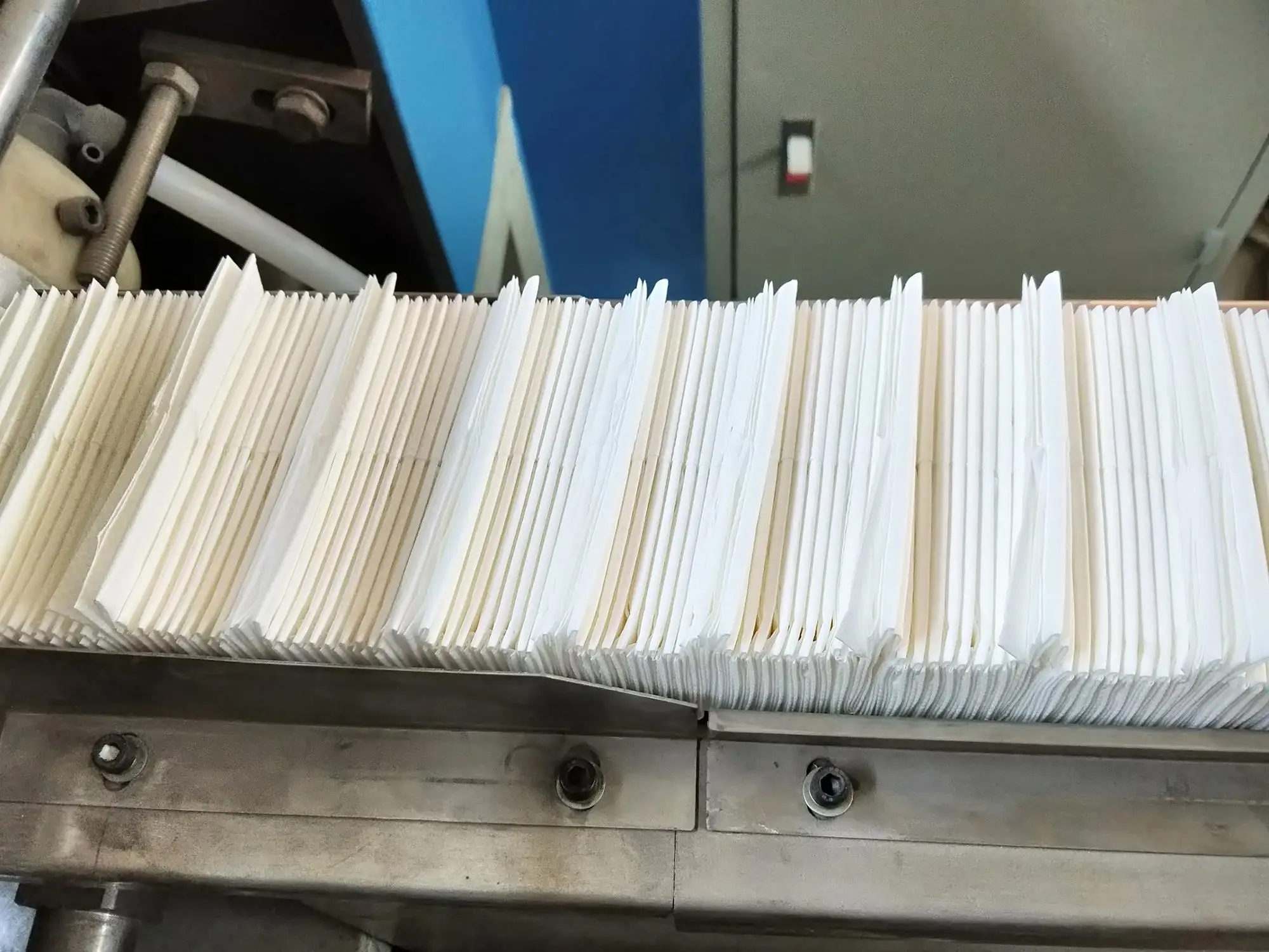 Automatic handkerchief tissue paper folding machine