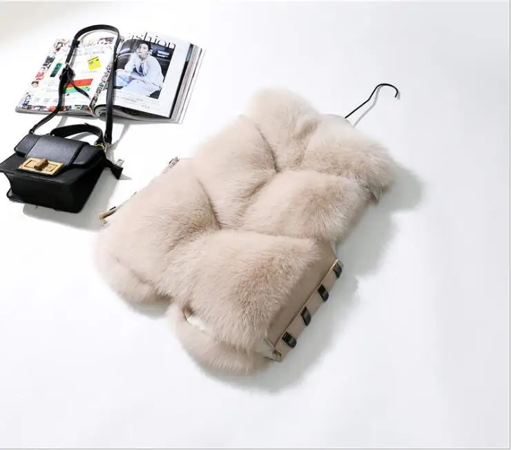 
STABILE Women Fashion Sleeveless Faux Fur Coat Autumn Winter Warm Fake Faux Fur Short Vest with metal fastener For Lady 