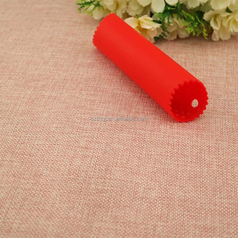 Attractive innovative silicone garlic peeler with dots inside