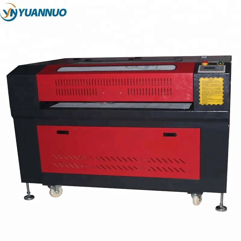 YN9060 YN1390 cnc laser engraving cutting machine on round objects