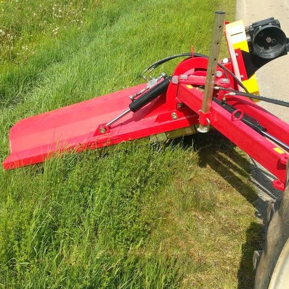 Tractor side mower attached to the rear suspension of the tractor and use the PTO