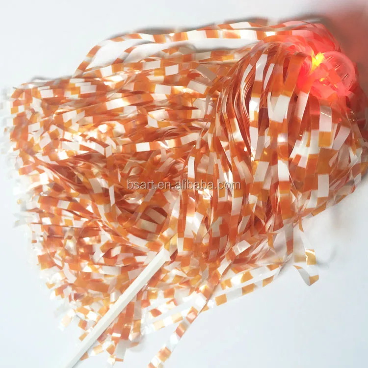 Orange and white LED cheerleading pompom / pom pon on plastic stick