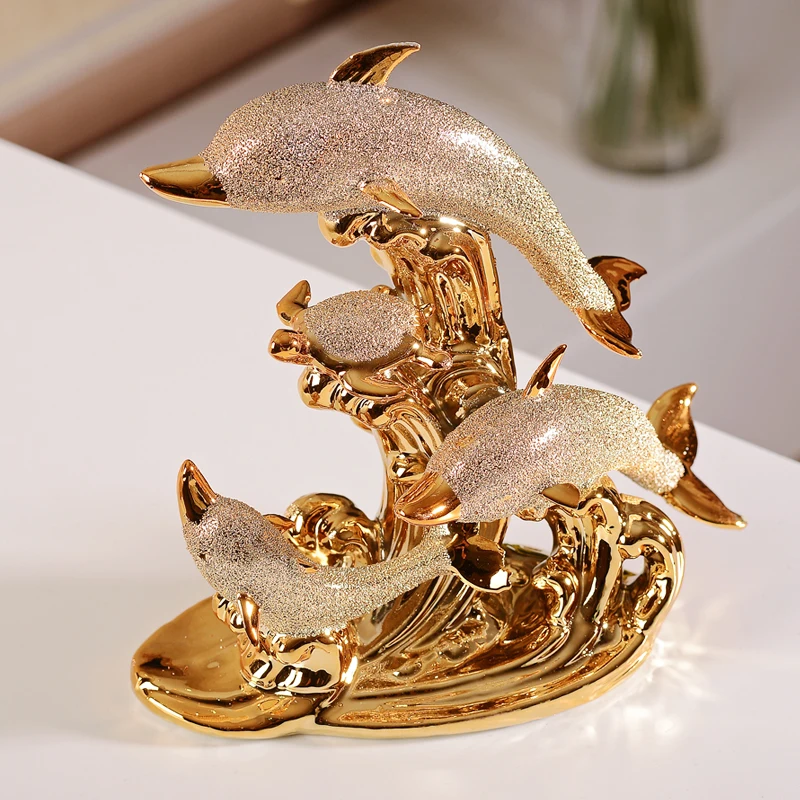 
Fashionable design gold color plated custom ceramic dolphin statues 