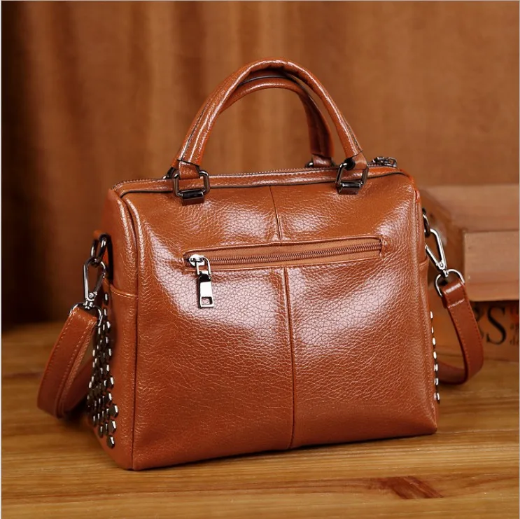 generation of handbags new European and American Boston pillow bag retro fashion handbag rivet Messenger shoulder bag