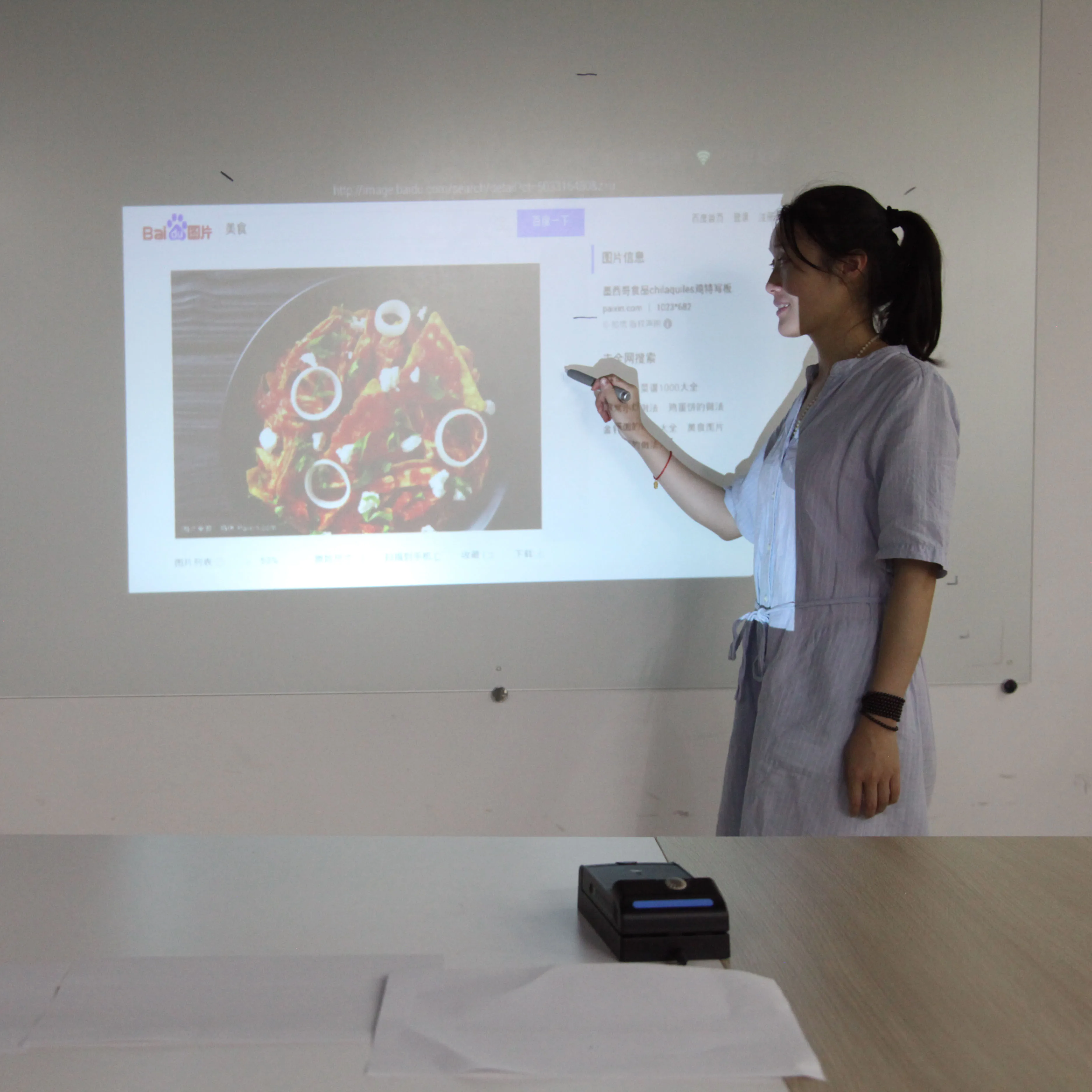 Portable interactive wifi multimedia projector,  laser image calibration technology