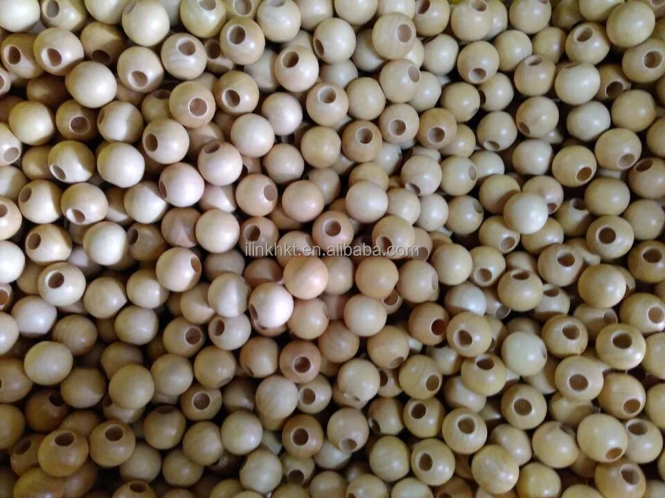 
Wooden balls with holes 