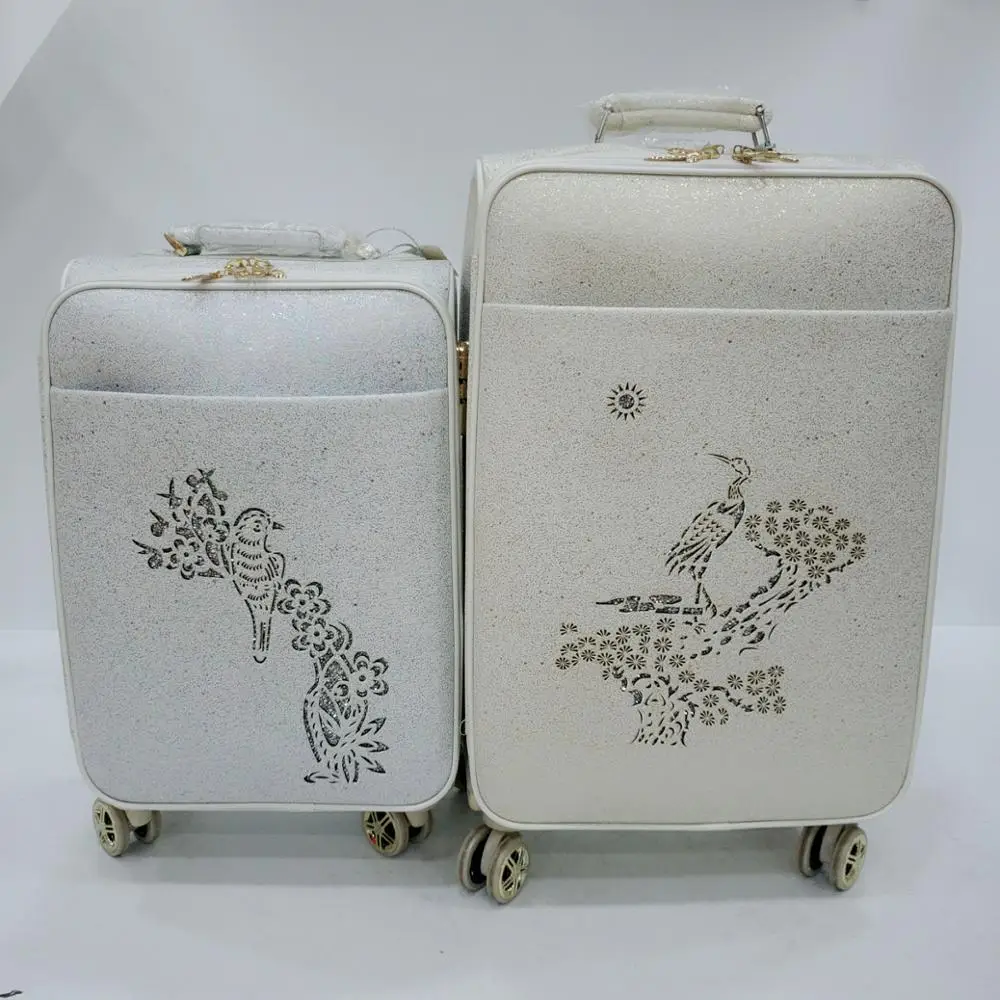 
pattern coating hollow bird white luggage 