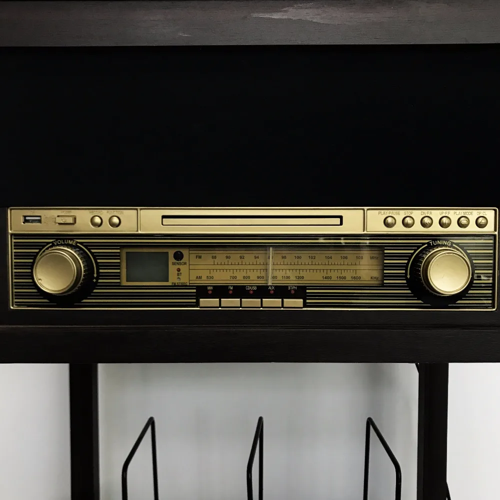 Vintage vinyl record turntable player with disc book shelf AM/FM stereo radio