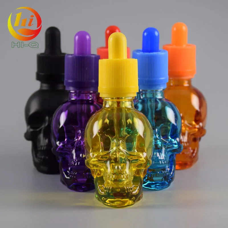 unique shape glass liquid bottle 15ml 30ml 50ml clear skull glass dropper bottle